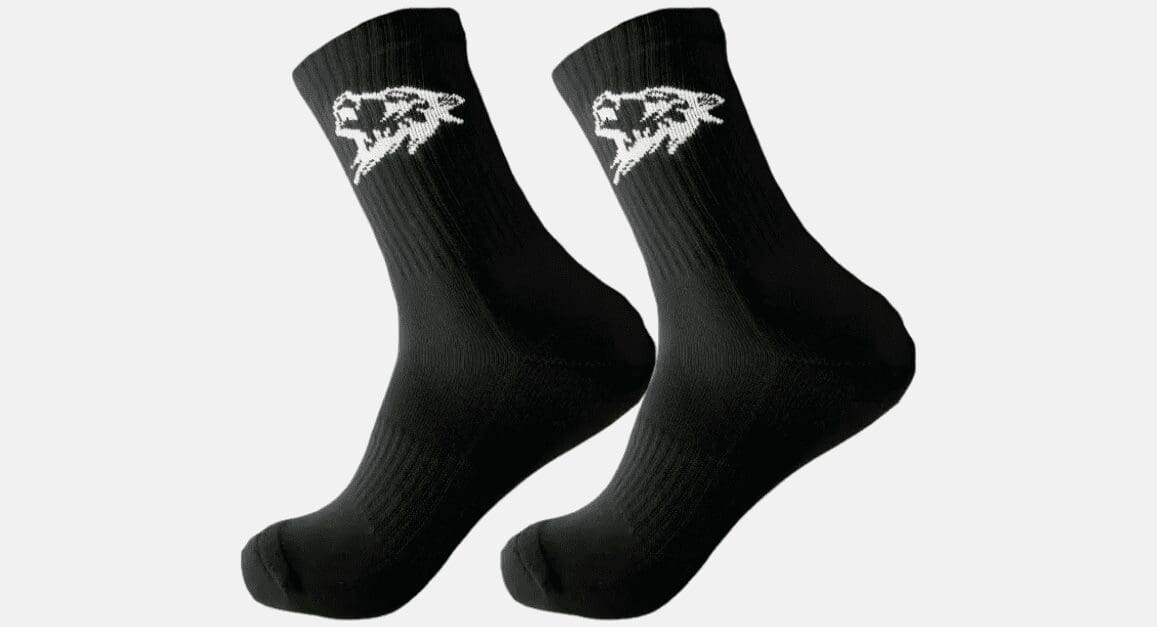 A pair of black socks with white logo on them.