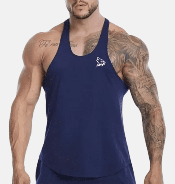 Man wearing a navy blue tank top with a wolf logo.