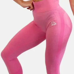 A woman is standing in pink leggings and a bra.