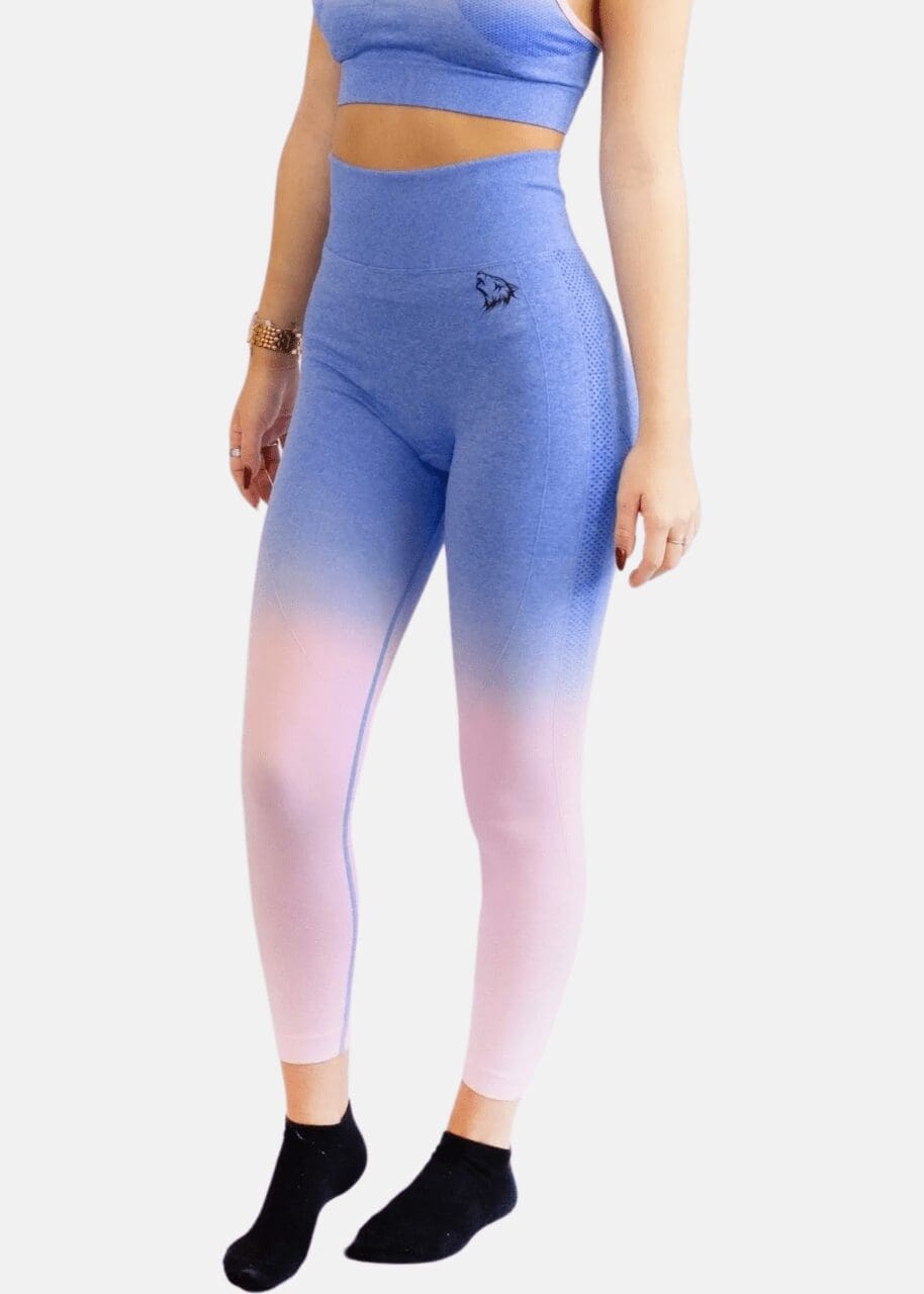 A woman is wearing blue and pink leggings