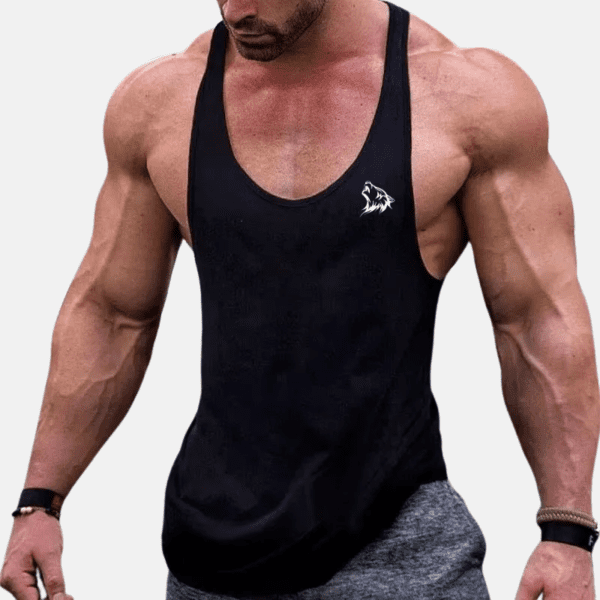 Man in black tank top with wolf logo.