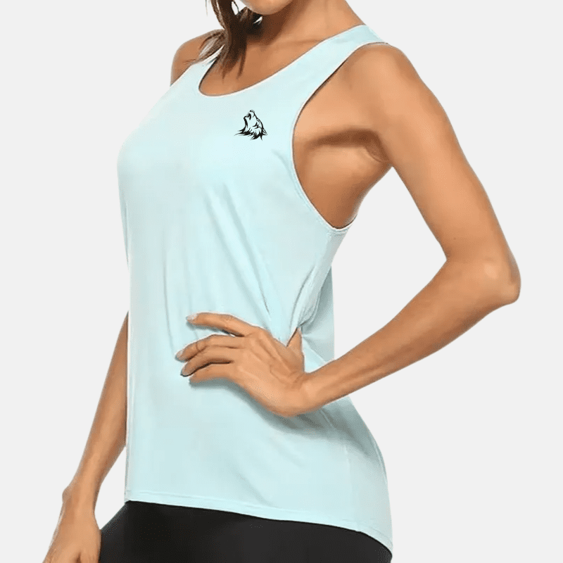 Woman wearing a blue tank top with a wolf design.