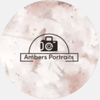 A white circle with the words ambers portraits in it.